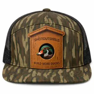 Camo trucker hat with leather duck patch